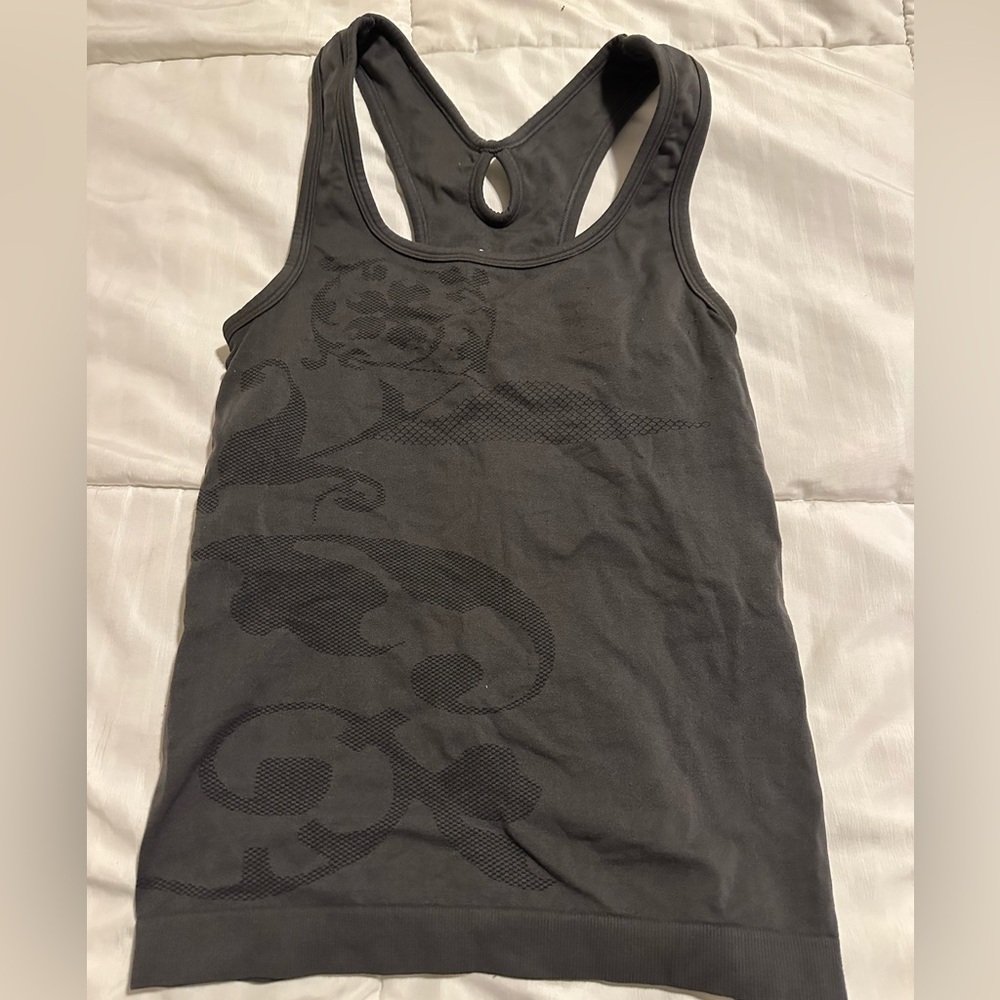 Women’s Morera dark grey seamless tank top with built in bra. Size medium.